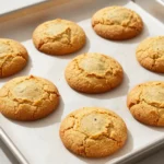 Close-up of brown butter pumpkin snickerdoodles on a white plate.